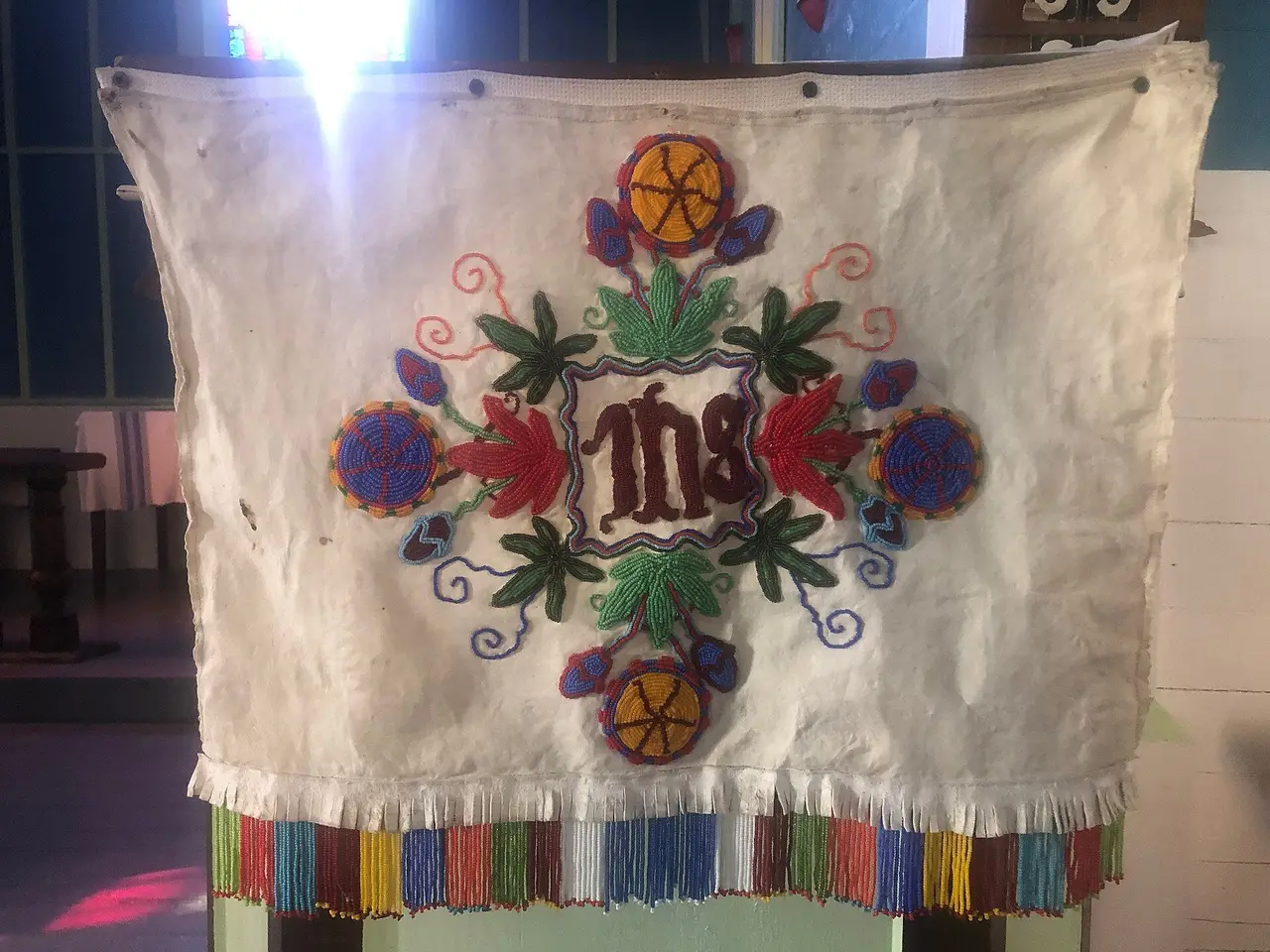 Beaded altar frontal with IHS design, 2024